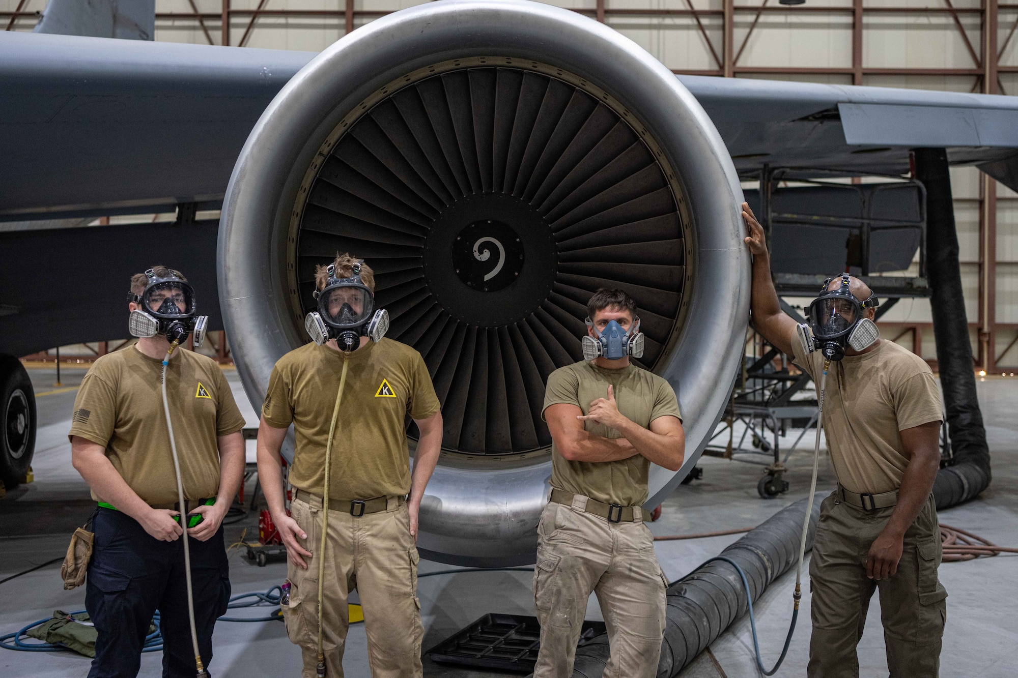 An aircraft fuels system mechanic assigned to the 3379th Expeditionary Maintenance Squadron dons a respirator at an undisclosed location within the U.S. Central Command area of responsibility, July 26, 2024.