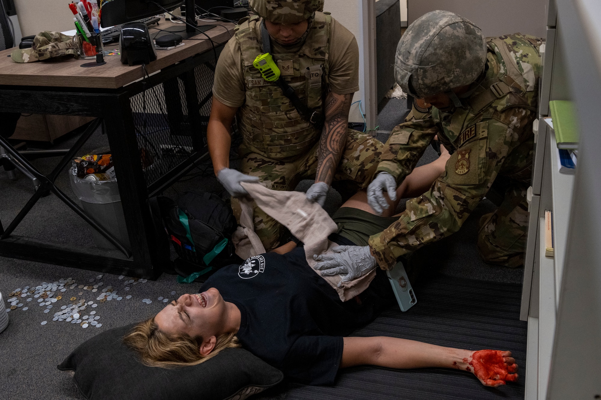 U.S. Airmen with the 35th Civil Engineer Squadron respond to a casualty scenario during an active shooter exercise at Misawa Air Base, Japan, Aug. 1, 2024.
