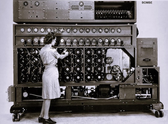 A member of the WAVES operates the cryptanalytic Bombe used by the U.S. Navy to determine the settings on the German four-rotor Enigma machine, ca. 1943–45.