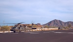 U.S. Army Soldiers from the Arizona National Guard conduct pre-flight checks before take off, August 1, 2024 in Phoenix, Arizona.