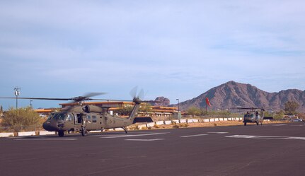 U.S. Army Soldiers from the Arizona National Guard conduct pre-flight checks before take off, August 1, 2024 in Phoenix, Arizona.