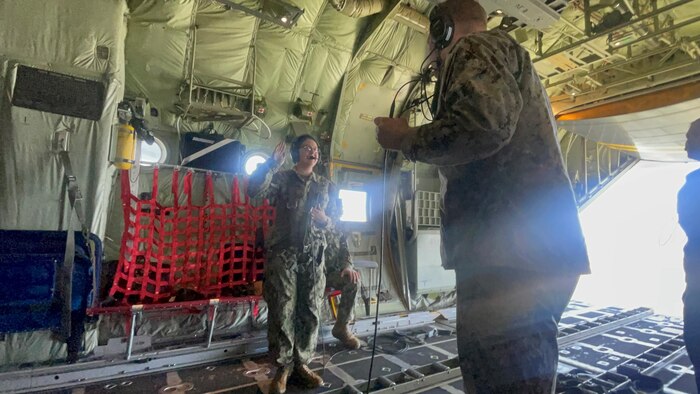 Navy Intelligence Specialist 1st Class Petty Officer Sarah Redsicker, reenlist aboard the U.S. Navy Blue Angels’ iconic “Fat Albert” C-130.