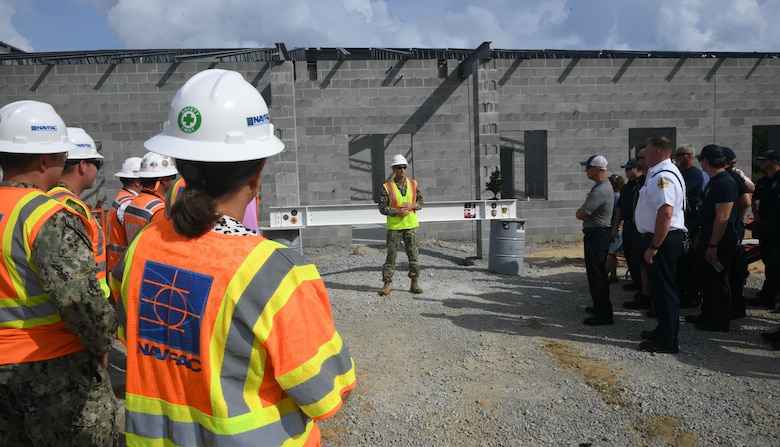 OICC Florence completes final topping out ceremony for fire station construction