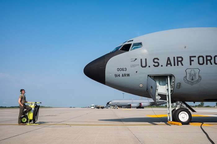 Senior Airman David Kelley, a Crew Chief with the 914th Aircraft Maintenance Squadron, stands close to a KC-135R Stratotanker at Niagara Falls Air Reserve Station.