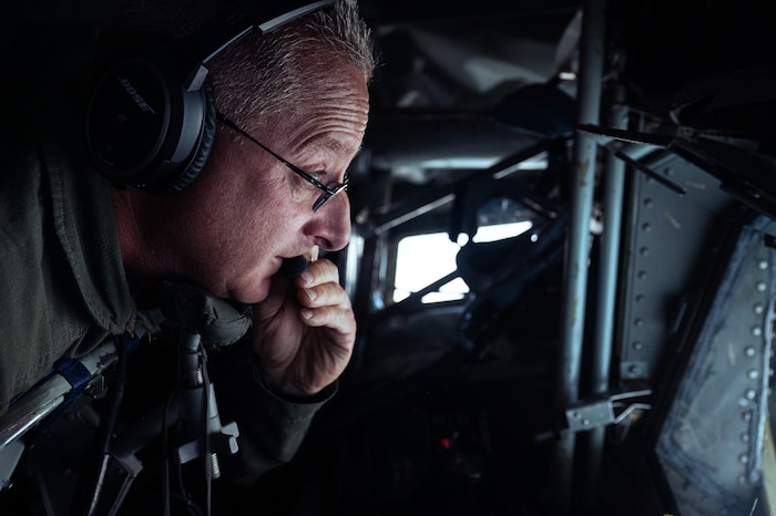Master Sgt. Maurice "Moe" Shivers III, a Boom Operator with the 328th Air Refueling Squadron, speaks to a pilot of an F-16C Fighting Falcon while on a refueling track August 1, 2024, somewhere over the Northeastern United States.