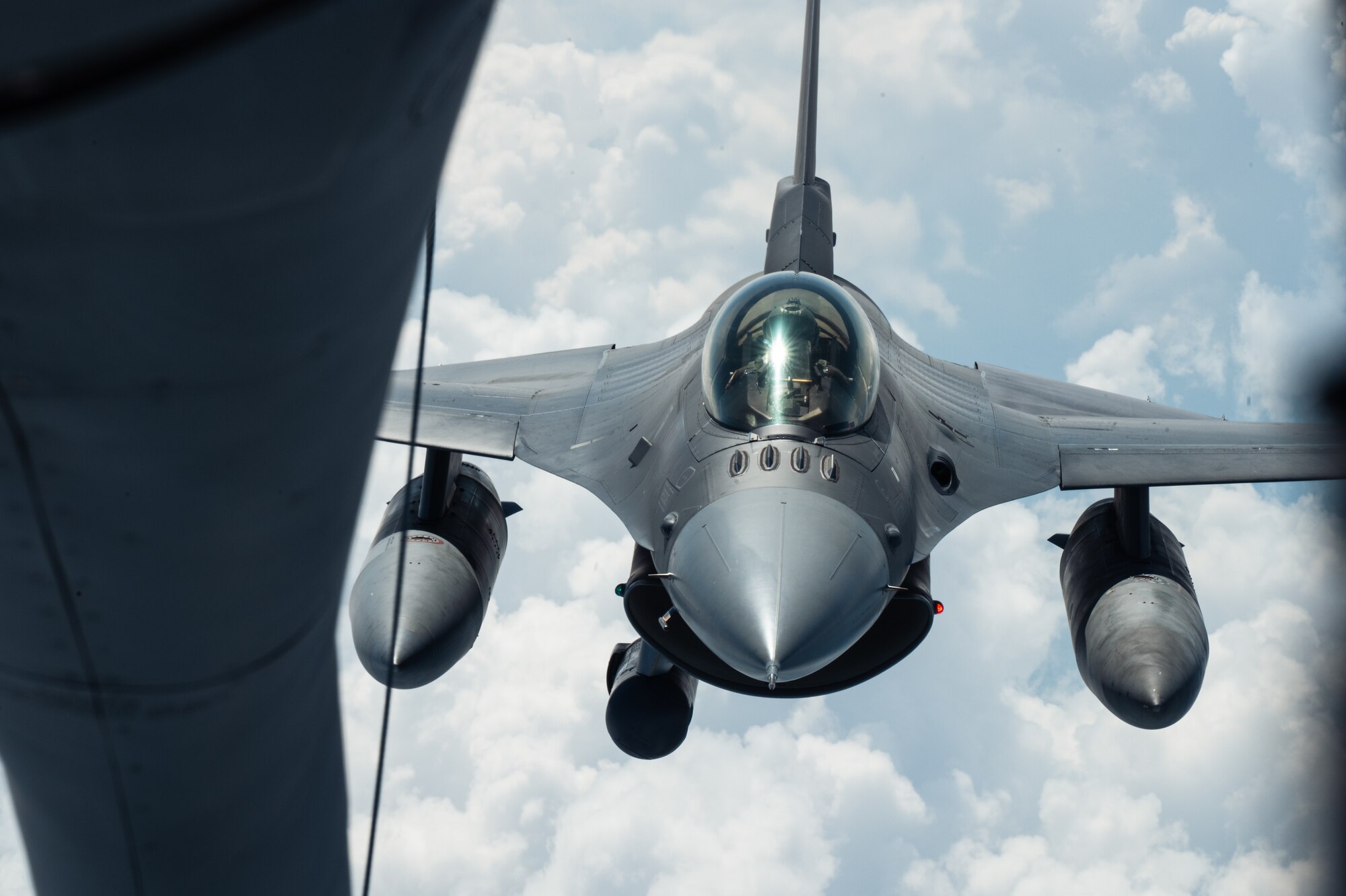 An F-16C Fighting Falcon attached to the 177th Fighter Wing, pulls behind a KC-135R Stratotanker from the 914th Air Refueling Wing, Niagara Falls Air Reserve Station.