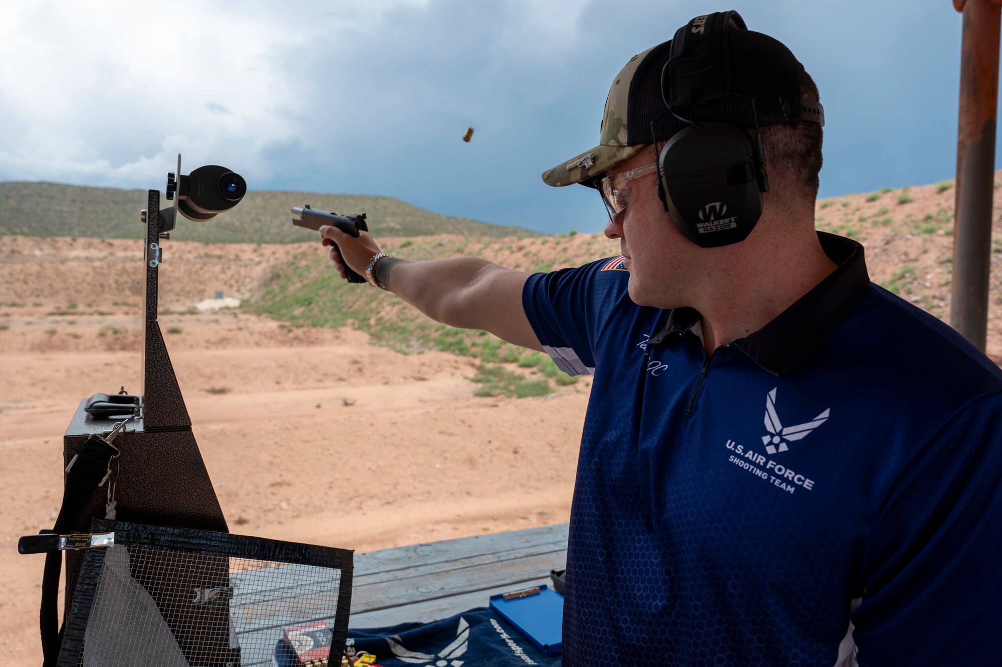 U.S. Air Force Master Sgt. Andrew Wilson, 8th Aircraft Maintenance Unit specialist section chief, shoots a Sig Sauer 1911 X series La Luz, New Mexico, July 28, 2024. Wilson coaches for the Air Force Blue Team and regularly competes in the Civilian Marksmanship Program at Camp Perry, Ohio. (U.S. Air Force photo by Airman 1st Class Michelle Ferrari)