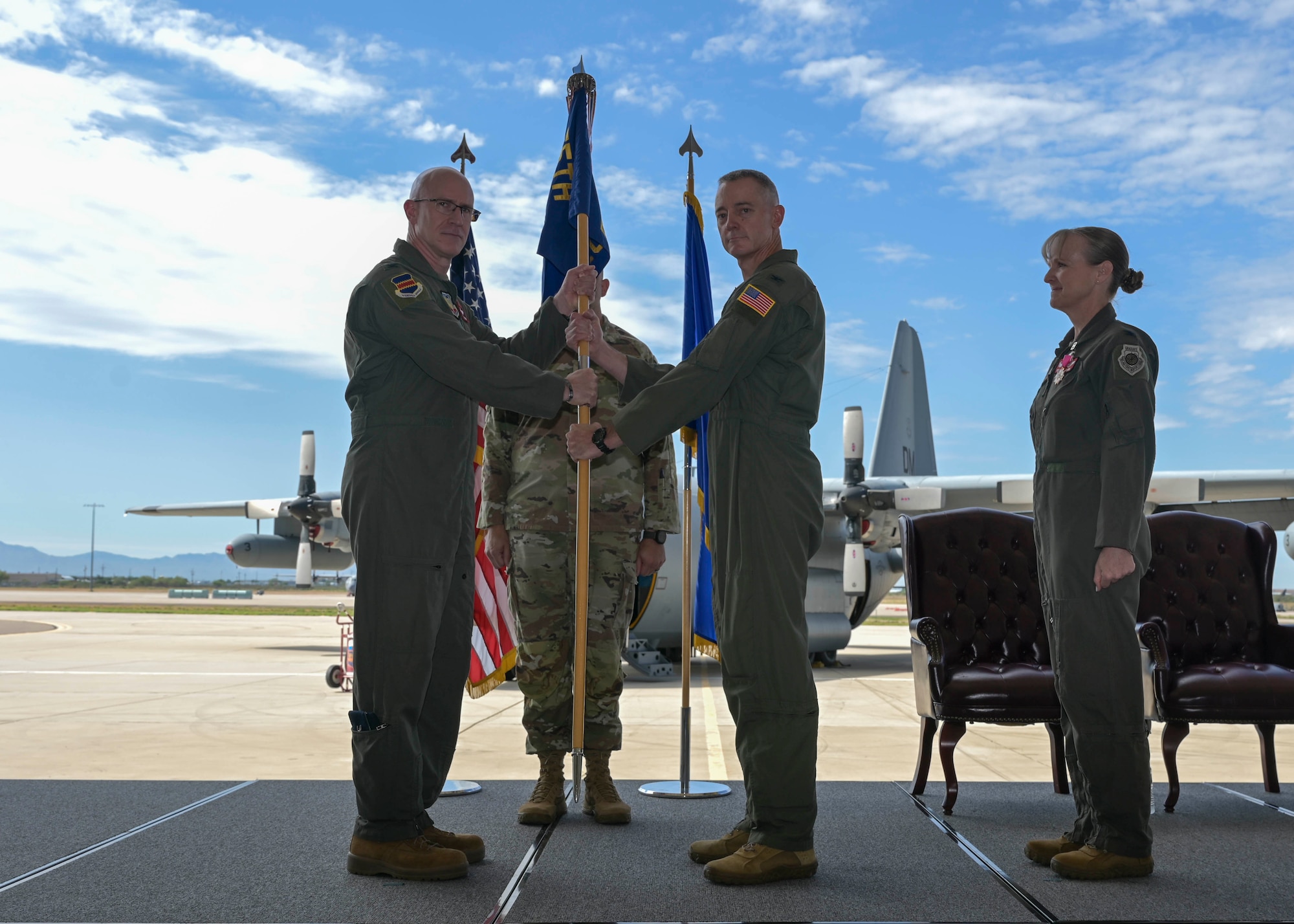 commanders pose with guidon