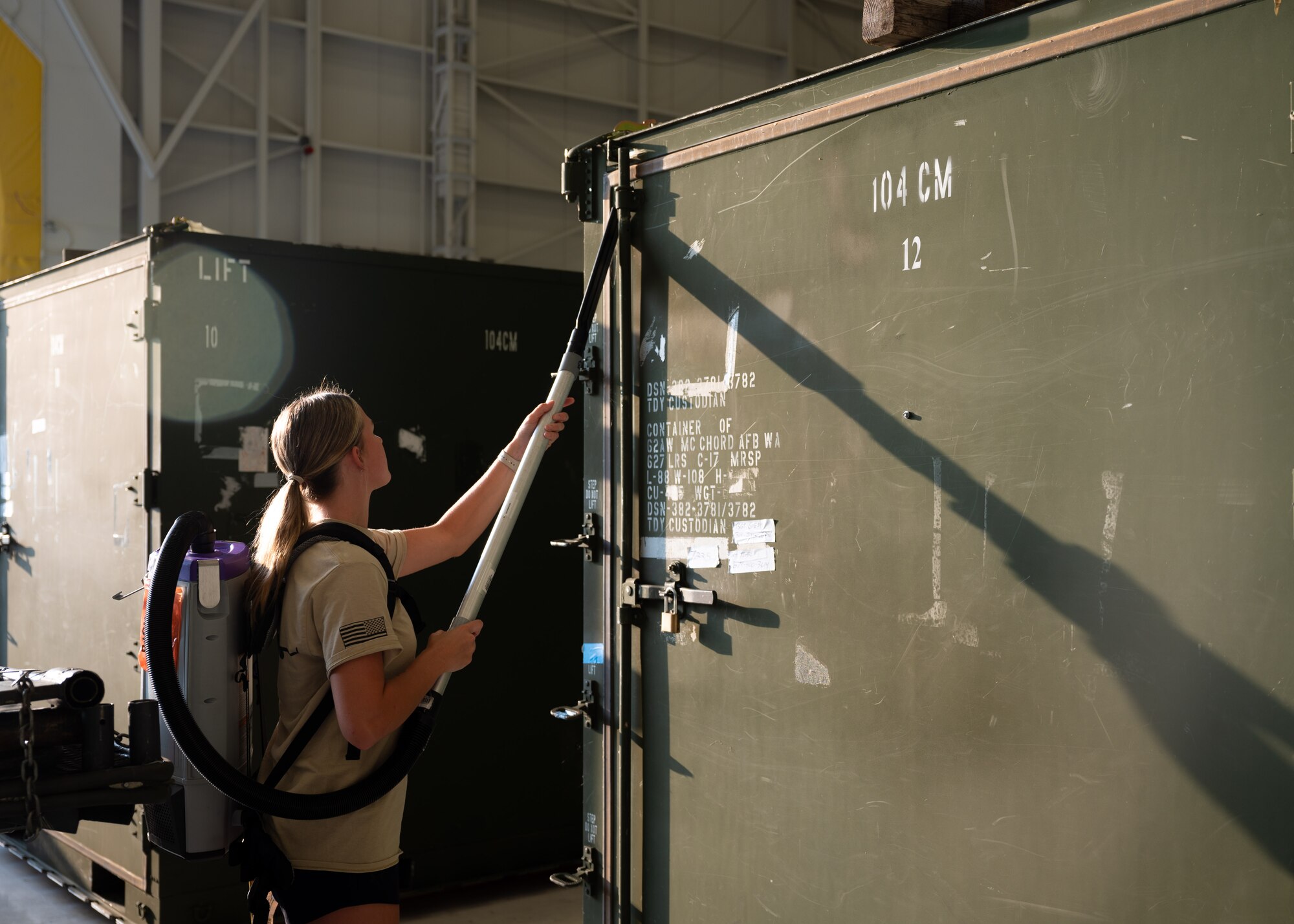 U.S. service members and volunteers prepare and clean equipment for an upcoming agile combat exercise, Operation KENNY’S RETURN, at Joint Base Lewis-McChord, Washington, August 2, 2024. The 62d Airlift Wing will combine with various units to form the 7th Expeditionary Airlift Squadron for the exercise, including Airmen from the 7th Airlift Squadron and the 627th Air Base Group.