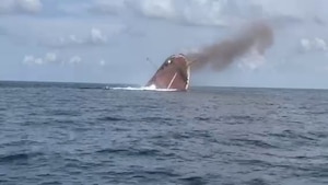 The M/V Monarch Countess slips below the surface after an operational demonstration in July in the waters of the Gulf of Mexico near Eglin Air Force Base, Florida. (Courtesy photo)
