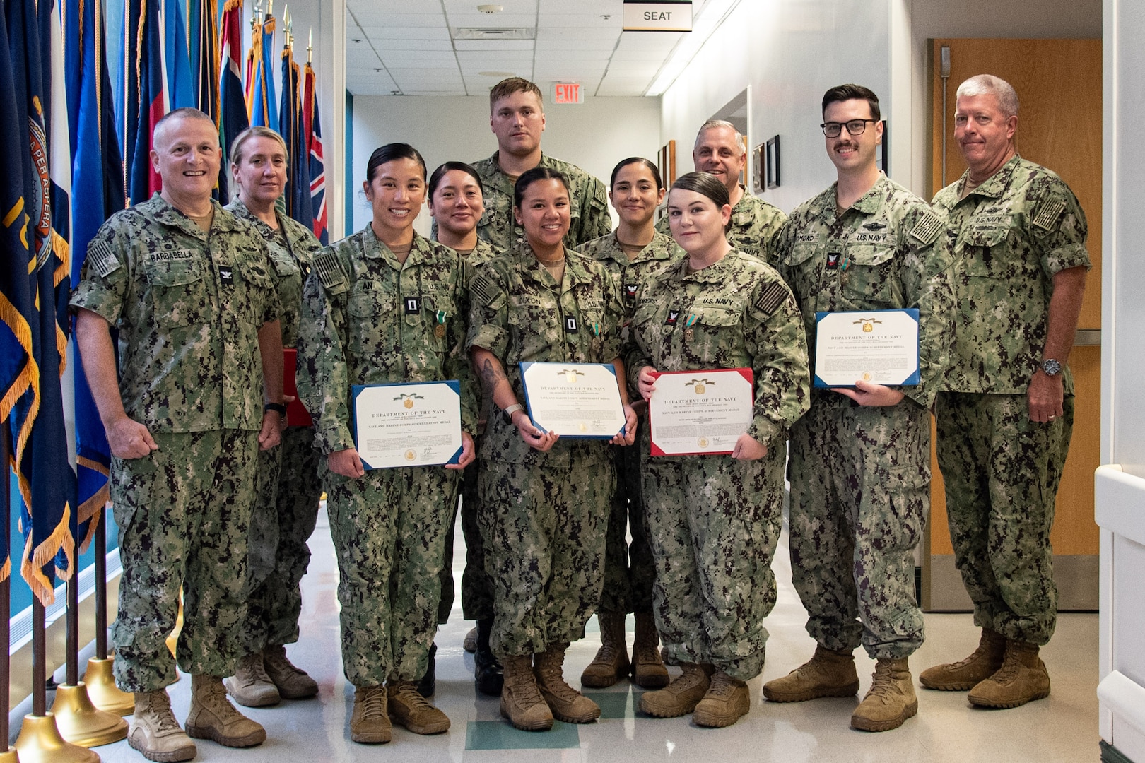 Sailors and staff serving aboard Naval Health Clinic Cherry Point celebrated their peers’ accomplishments during an award ceremony held aboard the facility on Wednesday, July 31.

LT Amanda An, third from left, was awarded the Navy and Marine Corps Commendation Medal. Awarded the Navy and Marine Corps Achievement Medal were Lieutenant Commander Amy Zaycek, second from left, HM2 Nancy Morales, fourth from left, HM3 Joseph Kitchin, LT Lauren Dixon, HM2 Joyce Serna, HM2 Ashlyn Sanders and HM2 Matthew Redmond.