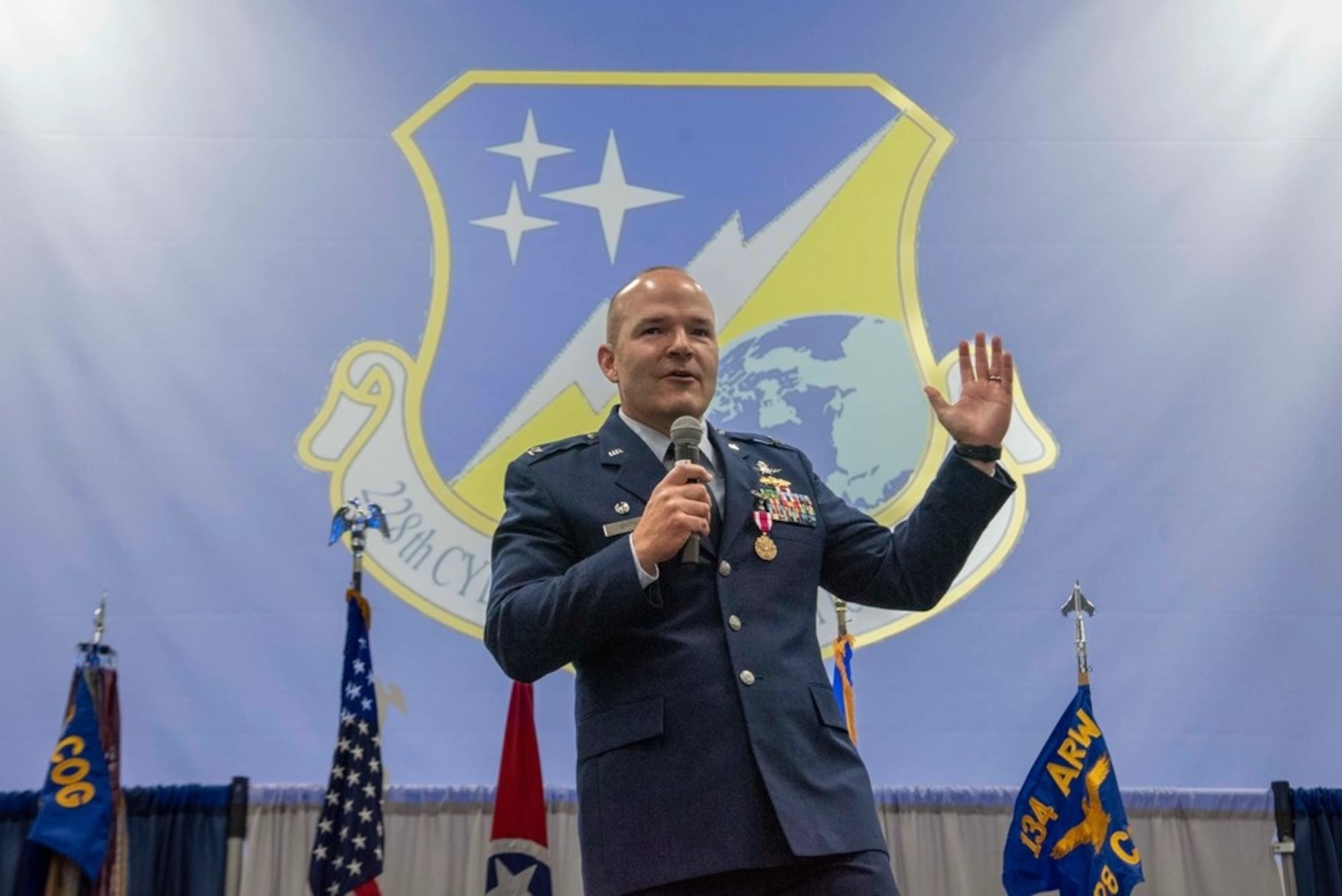 Col. Christopher Smith, 228th Cyberspace Operations Group commander, speaks at the activation ceremony for the 228th COG Aug. 4, 2024, at McGhee Tyson Air National Guard Base.
