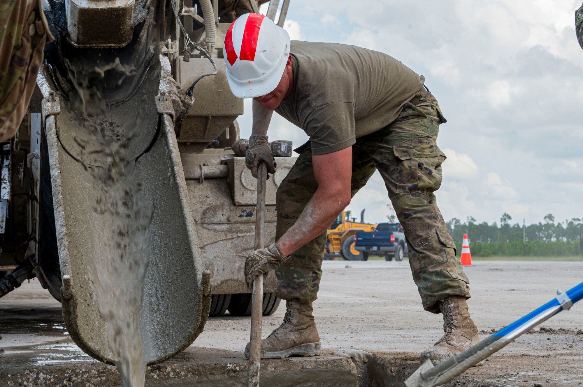 Airmen work on runway