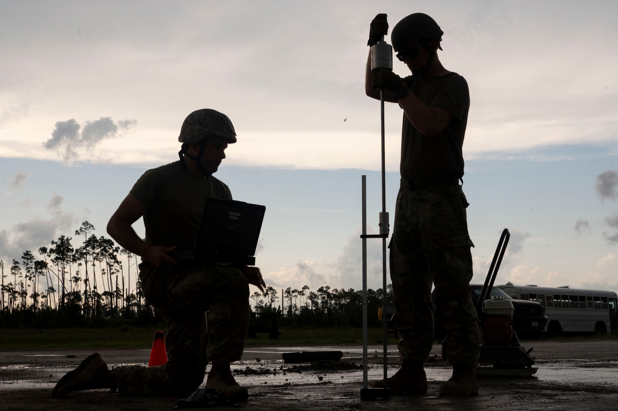 Airmen work on runway