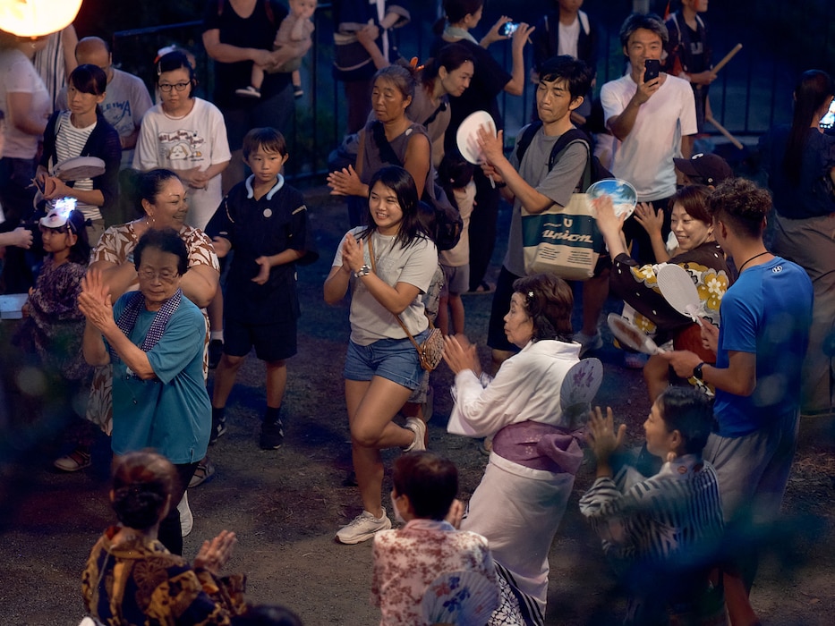 Commander, Fleet Activities Yokosuka community members participate in a Bon Odori at Ikego Shinmeisha Shrine across the street from Ikego Heights Family Housing August 3, 2024 in Zushi, Japan.