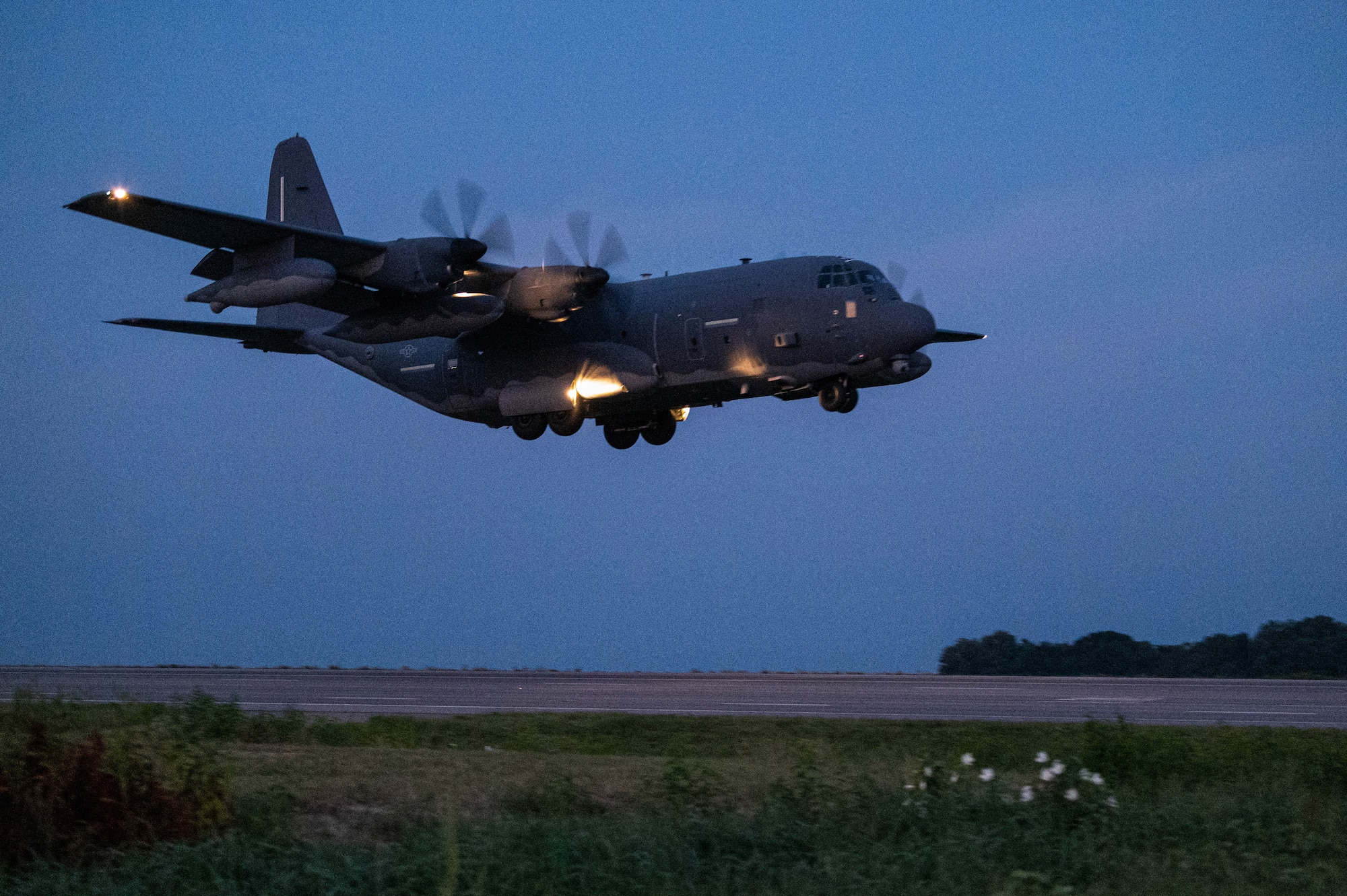 A U.S. Air Force MC-130J Commando II, assigned to the 492nd Special Operations Wing, lands on Highway 63 during Emerald Warrior 24 FTX II in Bono, Arkansas, August 4, 2024.