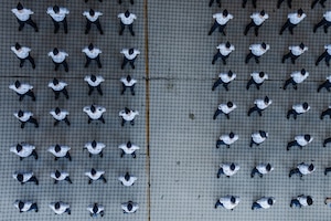 Aerial view of a group of airmen standing in formation.