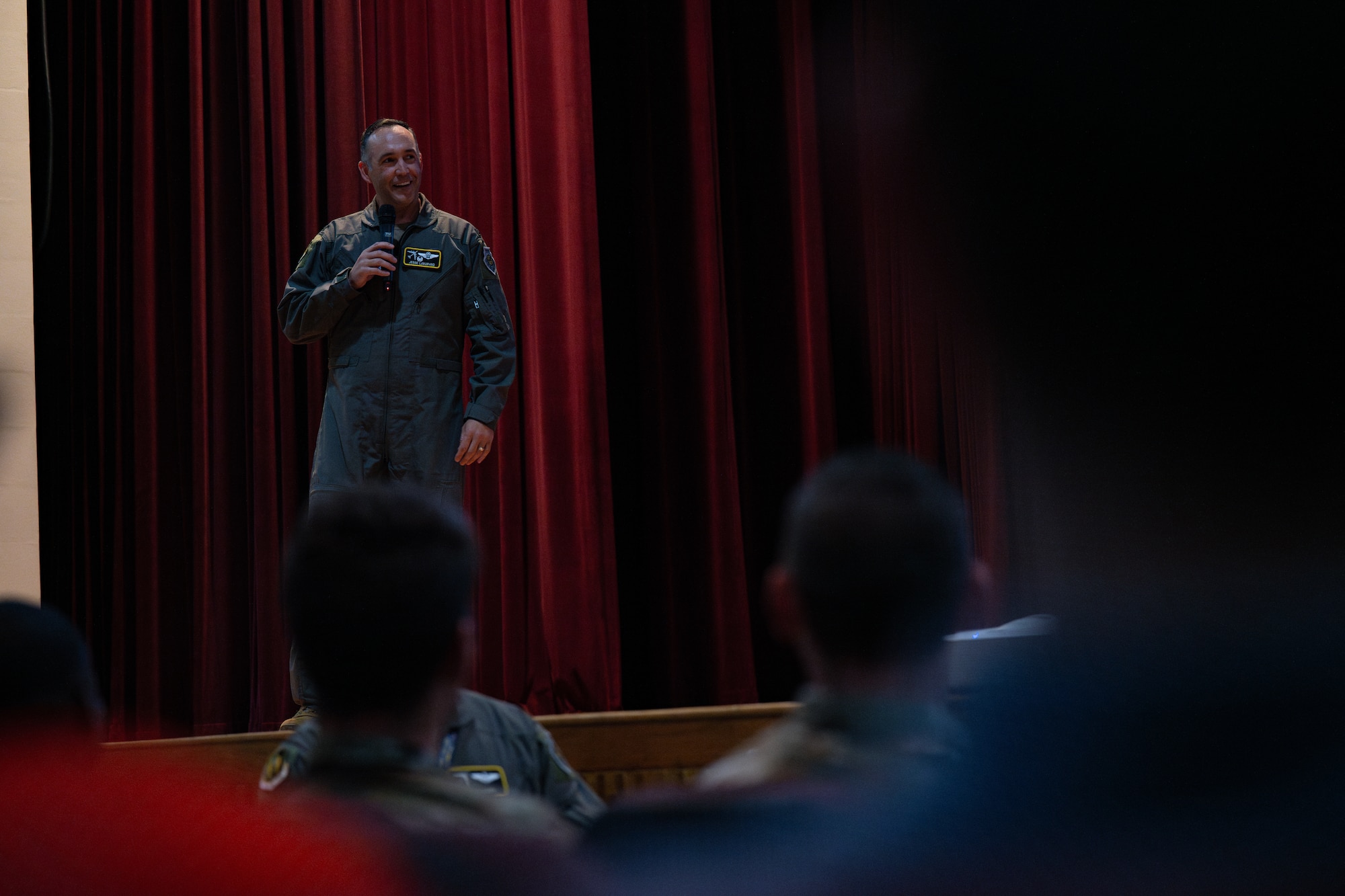 U.S. Air Force Col. Jesse Lamarand, 5th Bomb Wing (BW) commander, holds his inaugural 5th BW all-call at Minot Air Force Base, North Dakota, July 30, 2024. During the all-call, Lamarand introduced his leadership philosophy, which emphasizes the importance of interpersonal connection. (U.S. Air Force photo by Airman 1st Class Alyssa Bankston)
