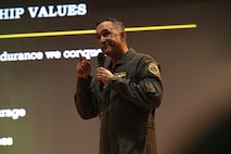 U.S. Air Force Col. Jesse Lamarand, 5th Bomb Wing (BW) commander, hosts his inaugural 5th BW all-call at Minot Air Force Base, North Dakota, July 30, 2024. Lamarand explained his leadership philosophy during the all-call, emphasizing the importance of interpersonal connection. (U.S. Air Force photo by Airman 1st Class Alyssa Bankston)