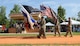 Commanding General of the Cyber Center of Excellence Maj. Gen. Ryan Janovic, former Commanding General Paul Stanton and his wife Nomi review the command during the Pass and Review at a Change of Command ceremony Aug. 2, 2024 at Barton Field on Fort Eisenhower, Ga.