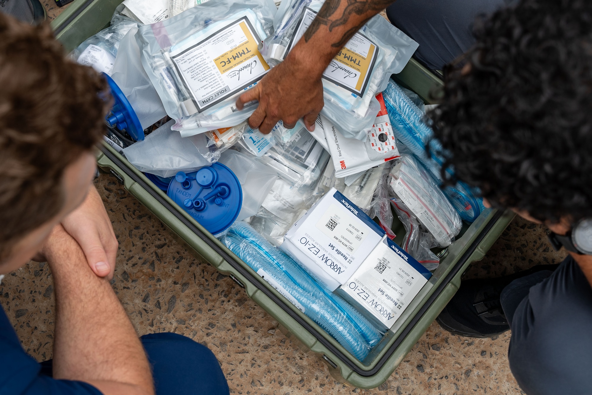 U.S. Army Capt. Mathew Rodgers (left), emergency room nurse assigned to the 759th Forward Resuscitative Surgical Detachment (Airborne), and U.S. Army Staff Sgt. Kadrian Rolston (right), detachment sergeant assigned to the 759th FRSD (ABN), organize medical supplies during AMISTAD 24 in Filadelfia, Paraguay, July 31, 2024. The 759th FRSD (ABN) is one of three Airborne surgical teams in the U.S. Army. The unit was originally activated in 1945 and has a rich history of deployment in support of Vietnam War, Operation Iraqi Freedom, Operation Enduring Freedom and Operation Freedom Sentinel. The normal battle rhythm for the 759th FRSD (ABN) involves a robust training regimen of tactical training, clinical skills, and airborne operations. (U.S. Air Force photo by Tech. Sgt. Carly Feliciano)