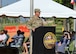 Commanding General of the U.S. Army Cyber Center of Excellence  Maj. Gen. Ryan Janovic speaks to the crowd after assuming command in a Change of Command ceremony Aug. 2, 2024, at Barton Field on Fort Eisenhower, Ga.