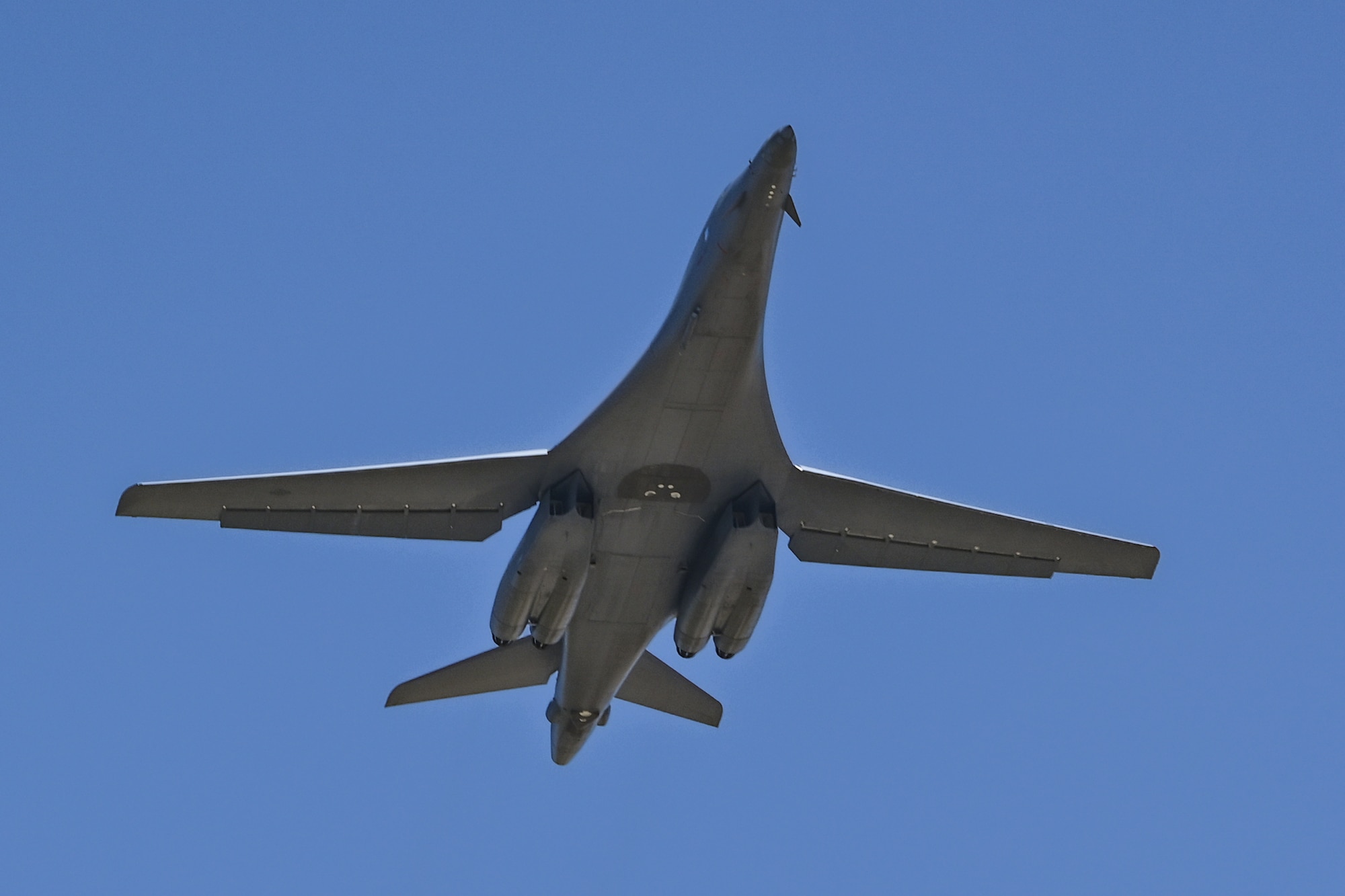 A U.S. Air Force B-1B Lancer returns after a CONUS-to-CONUS bomber mission at Ellsworth Air Force Base, S.D., Aug. 2, 2024. U.S. Strategic Command forces are on watch 24/7/365 to deter and detect strategic attack against the U.S. and our Allies. (U.S. Air Force photo by Staff Sgt. Jake Jacobsen)
