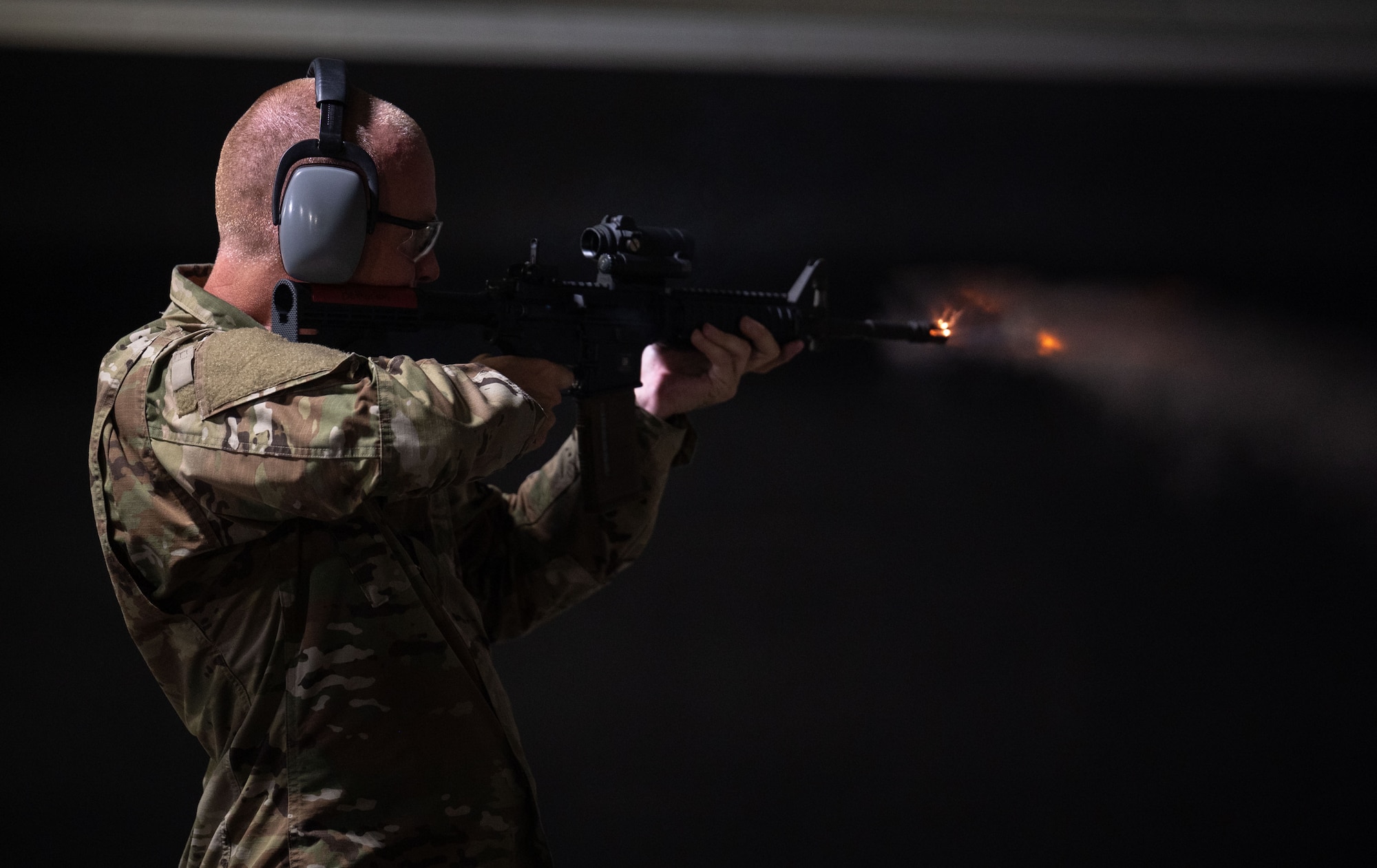 Command Chiefs from Air Mobility Command shoot live ammunition at Scott Air Force Base, Illinois, July 31, 2024. AMC and Chief Master Sgt. Jamie Newman, AMC command chief, hosted a Command Chief Symposium, driving home the importance of maintaining a warfighter’s mindset. The symposium provided chiefs with the knowledge needed to improve or create their wing's own Warrior Heart program. (U.S. Air Force photo by Rachel Sansano)