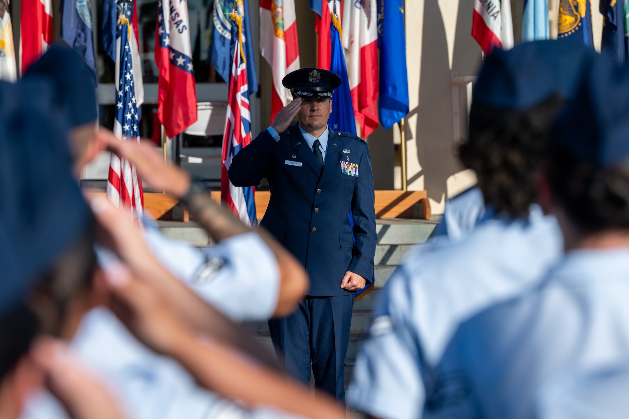 Commander receives first salute.