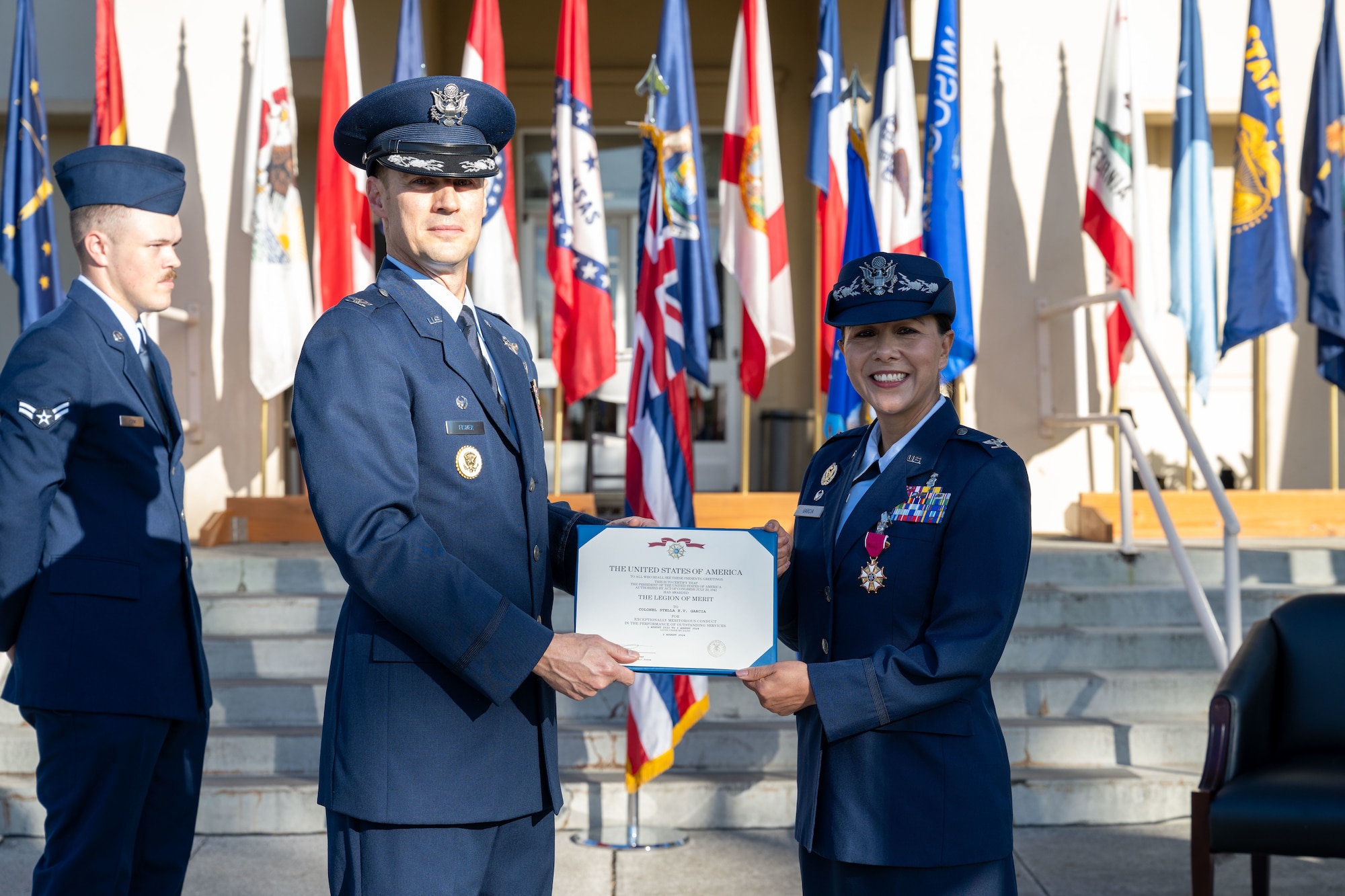 Airmen hold a certificate.