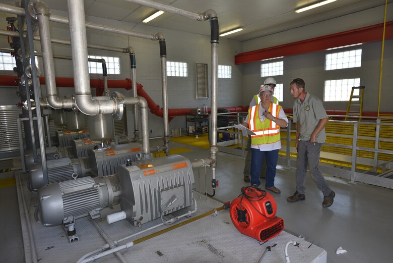 Cathie Desjardin, a U.S. Army Corps of Engineers emergency operations technician from the Seattle district inspects a vacuum driven collection system in Key Largo, Florida at the Key Largo Waste Water district center.   The vacuum system sustained damage and provides service a 16-mile stretch of homes and businesses in the upper Florida Keys.  The Corps received mission assignments to help assess Water/Wastewater requirements in the Keys, Monroe County, where thousands of homes were severely damaged by Hurricane Irma. (USACE photo by Mark Rankin)