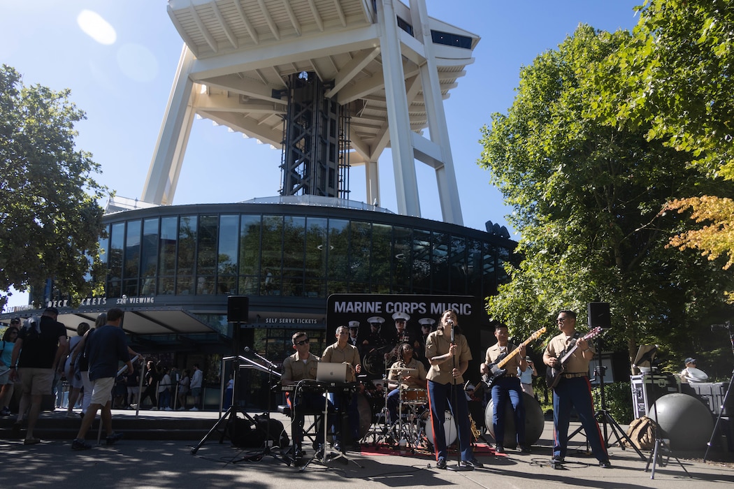 U.S. Marines with the 1st Marine Division Band perform at the Space Needle as part of Seattle Seafair Fleet Week in Seattle, Aug. 1, 2024. The U.S. Navy, Coast Guard, and Marines have been involved in Seafair in some way since the festival began 75 years ago. The annual event provides service members an opportunity to interact with the American people and promotes the Navy-Marine Corps team as the nation’s expeditionary force in readiness. (U.S. Marine Corps photo by Sgt. Cameron Hermanet)