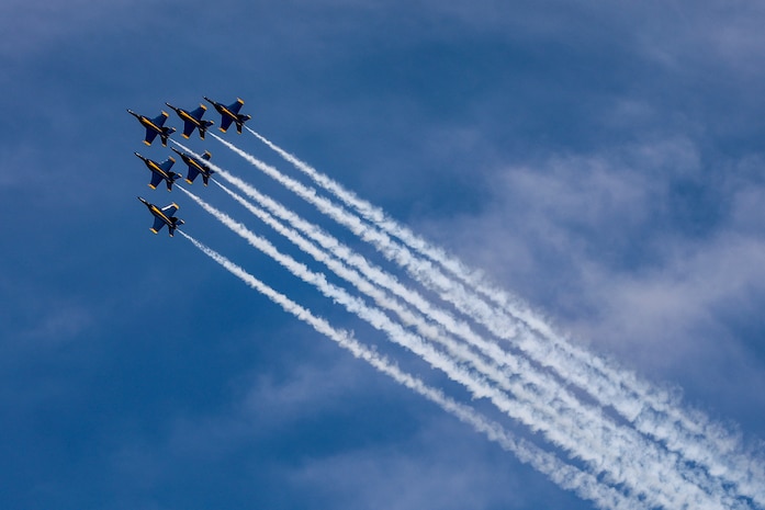 The U.S. Navy Blue Angels flight demonstration team performs over Lake Washington, Seattle, as part of Seattle Seafair Fleet Week Aug. 2, 2024.  Seattle Fleet Week is a time-honored celebration of the sea services and provides an opportunity for the citizens of Washington to meet Sailors, Marines and Coast Guardsmen, as well as witness firsthand the latest capabilities of today’s maritime services. (U.S. Navy photo by Mass Communication Specialist 1st Class Jacob I. Allison)