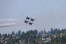 The U.S. Navy Blue Angels flight demonstration team performs over Lake Washington, Seattle, as part of Seattle Seafair Fleet Week Aug. 2, 2024. Seattle Fleet Week is a time-honored celebration of the sea services and provides an opportunity for the citizens of Washington to meet Sailors, Marines and Coast Guardsmen, as well as witness firsthand the latest capabilities of today’s maritime services. (U.S. Navy photo by Mass Communication Specialist 3rd Class Justin Ontiveros)