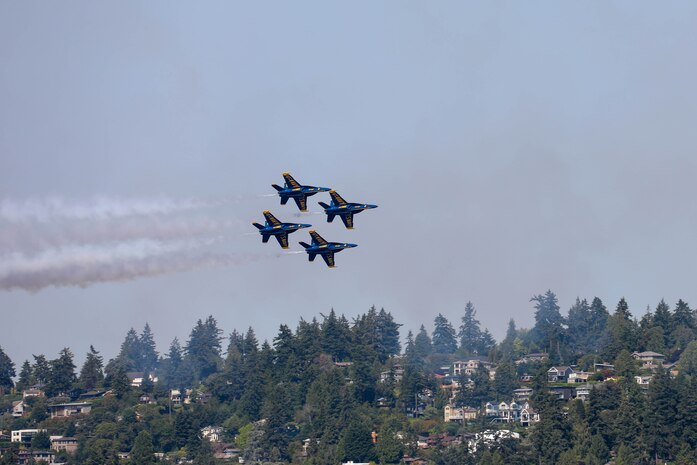 The U.S. Navy Blue Angels flight demonstration team performs over Lake Washington, Seattle, as part of Seattle Seafair Fleet Week Aug. 2, 2024. Seattle Fleet Week is a time-honored celebration of the sea services and provides an opportunity for the citizens of Washington to meet Sailors, Marines and Coast Guardsmen, as well as witness firsthand the latest capabilities of today’s maritime services. (U.S. Navy photo by Mass Communication Specialist 3rd Class Justin Ontiveros)