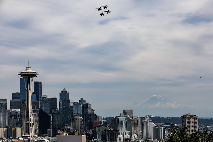 The U.S. Navy Blue Angels flight demonstration team fly over Seattle during Seattle Seafair Fleet Week Aug. 3, 2024.  Seattle Fleet Week is a time-honored celebration of the sea services and provides an opportunity for the citizens of Washington to meet Sailors, Marines and Coast Guardsmen, as well as witness firsthand the latest capabilities of today’s maritime services. (U.S. Navy photo by Mass Communication Specialist 1st Class Jacob I. Allison)