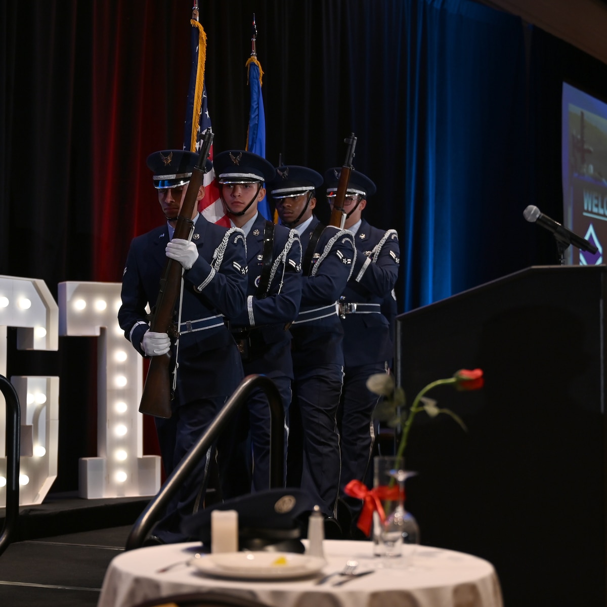 U.S. Airmen assigned to Davis-Monthan Air Force Base Honor Guard posted the colors during a senior noncommissioned officer induction ceremony in Tucson, Ariz., Aug. 2, 2024. Honor Guard members showcase Air Force heritage and embody personal and professional excellence. (U.S. Air Force photo by Staff Sgt. Abbey Rieves)