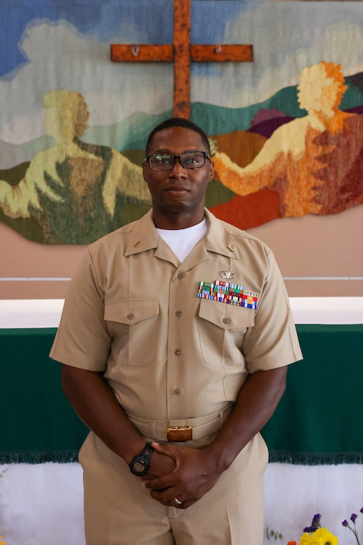 U.S. Navy Lt. j.g. Jimi Liddell Gayden, a newly commissioned Naval officer with 3rd Marine Aircraft Wing, poses after his commissioning ceremony at Marine Corps Base Camp Pendleton, California, July 30, 2024. Following 28 years of service in the U.S. Marine Corps, Liddell Gayden commissioned as a lieutenant junior grade in the U.S. Navy to pursue a new career as a chaplain. Liddell Gayden will attend Navy Officer Development School this fall, followed by Naval Chaplaincy School.  (U.S. Marine Corps photo by Cpl. Nicholas Johnson)