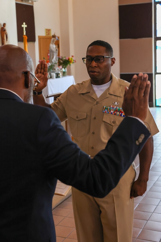 U.S. Marine Corps Master Gunnery Sgt. Jimi Liddell Gayden, an intelligence chief with 3rd Marine Aircraft Wing, swears in during his commissioning ceremony at Marine Corps Base Camp Pendleton, California, July 30, 2024. Following 28 years of service in the U.S. Marine Corps, Liddell Gayden commissioned as a lieutenant junior grade in the U.S. Navy to pursue a new career as a chaplain. Liddell Gayden will attend Navy Officer Development School this fall, followed by Naval Chaplaincy School. (U.S. Marine Corps photo by Cpl. Nicholas Johnson)