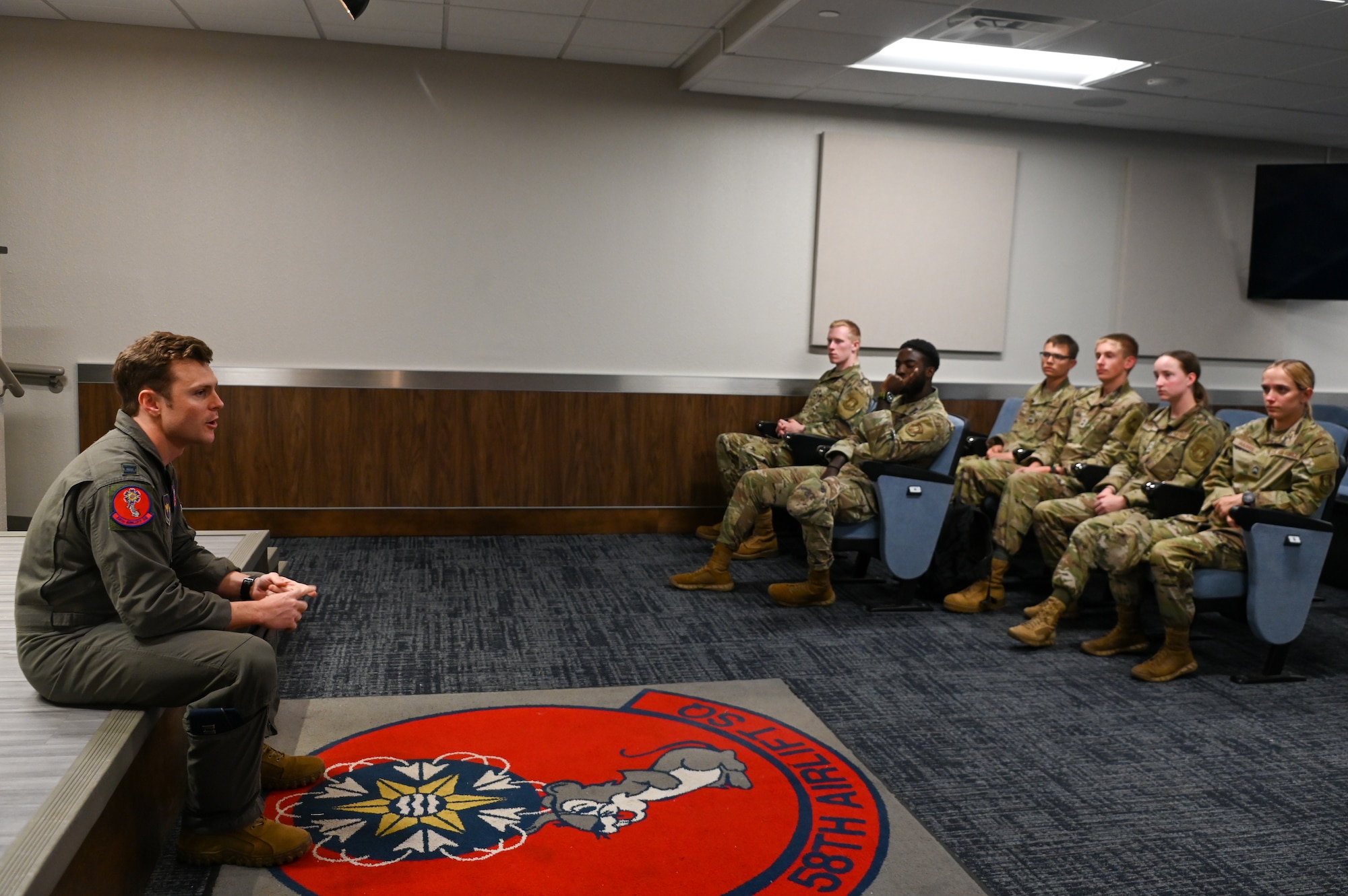 U.S. Air Force Capt. Kevin Foley, 58th Airlift Squadron instructor pilot, answers questions for Air Force ROTC cadets at Altus Air Force Base, Oklahoma, June 24, 2024. The cadets visiting throughout the summer of 2024 were from different universities nationwide. (U.S. Air Force photo by Senior Airman Kari Degraffenreed)