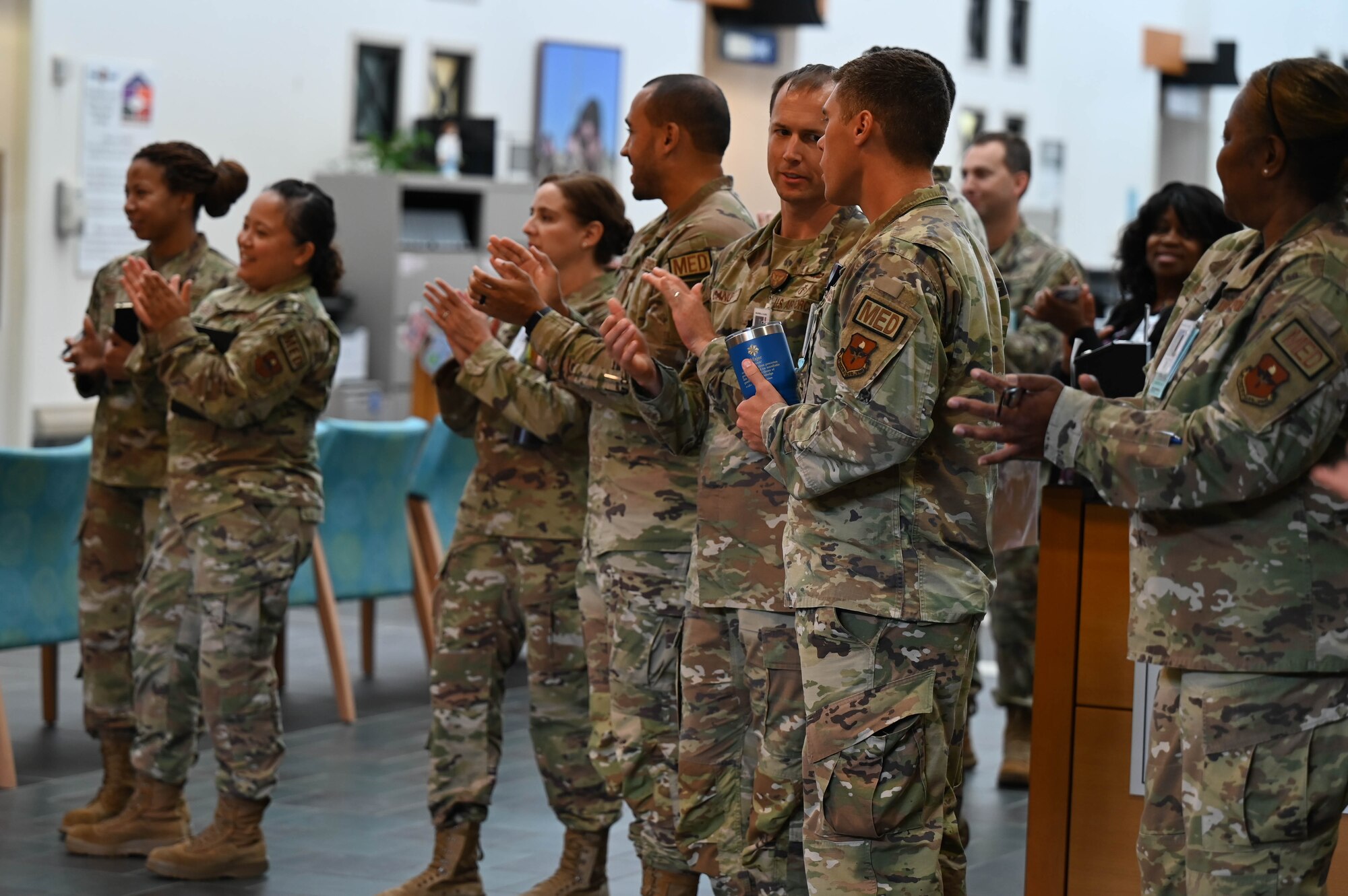 Members of the 42d medical group, attend the ribbon-cutting ceremony to commemorate the grand re-opening of Maxwell’s Pediatric Clinic Aug. 1, 2024. The clinic offers wellness visits, school and sports physicals, as well as sick appointments for any urgent care needs. (U.S. Air Force Photo by Airman 1st Class Tyrique Barquet)