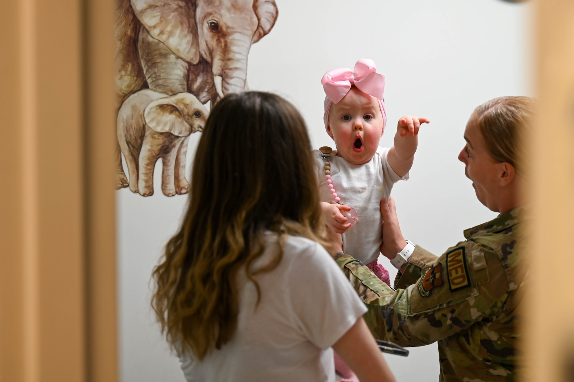 A baby receives a checkup at the 42d medical group pediatrics clinic on Maxwell Air Force Base Aug. 1, 2024. The clinic offers wellness visits, school and sports physicals, as well as sick appointments for any urgent care needs for children. (U.S. Air Force Photo by Airman 1st Class Tyrique Barquet)