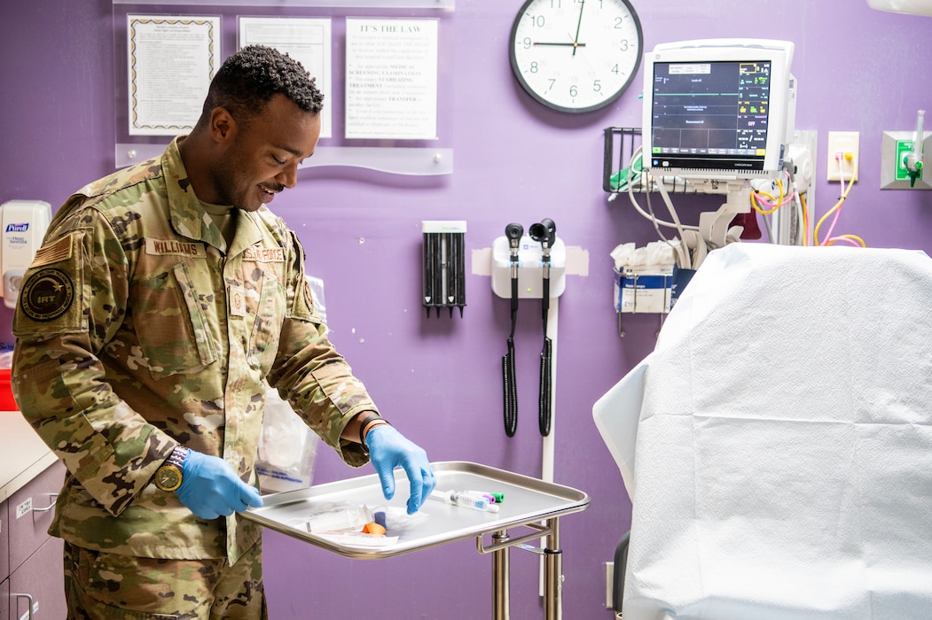 Image of Airmen conducting support with civilians.