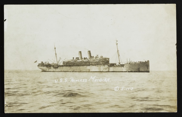 A transport ship at sea.