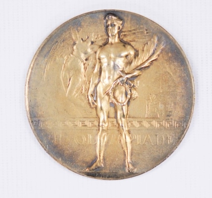 A gold gilt medal.