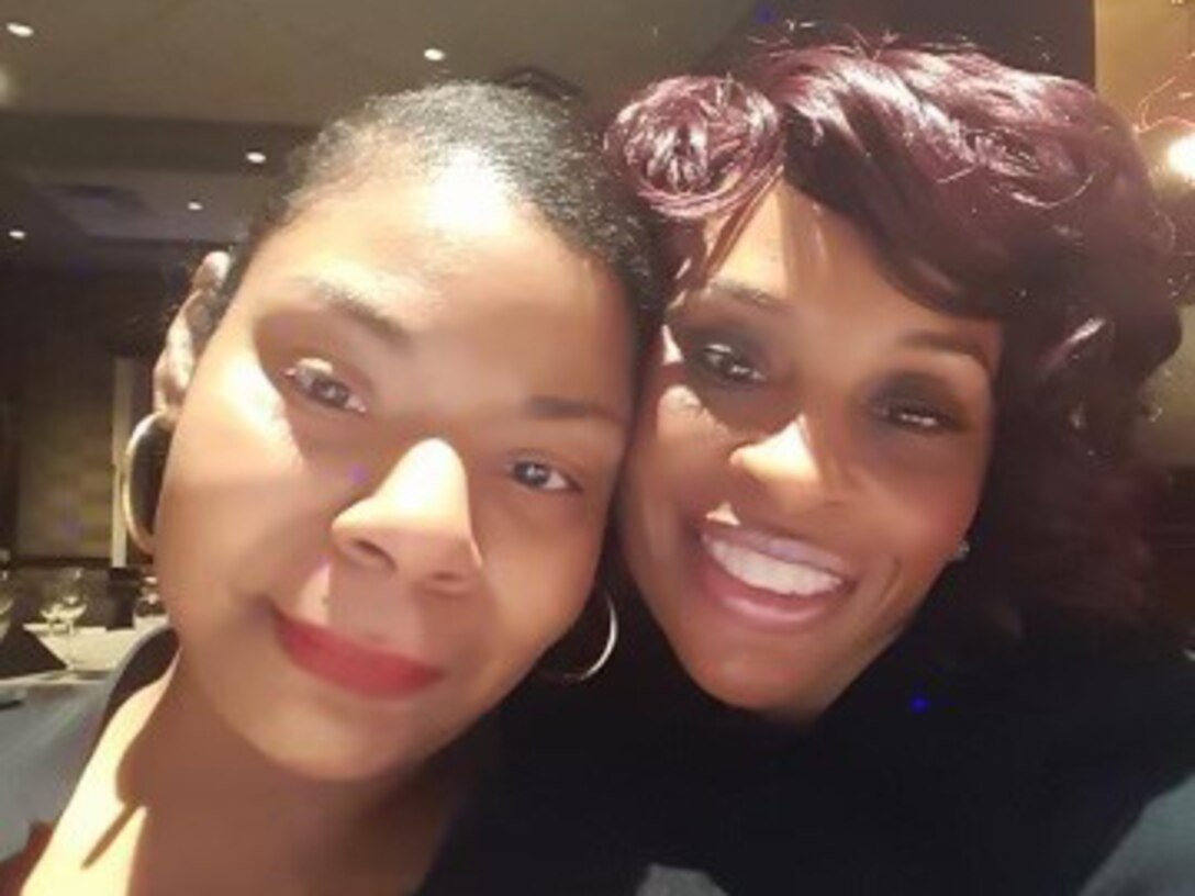 Adrienne Toliver poses with her sister, Aja Shedrick, who passed away