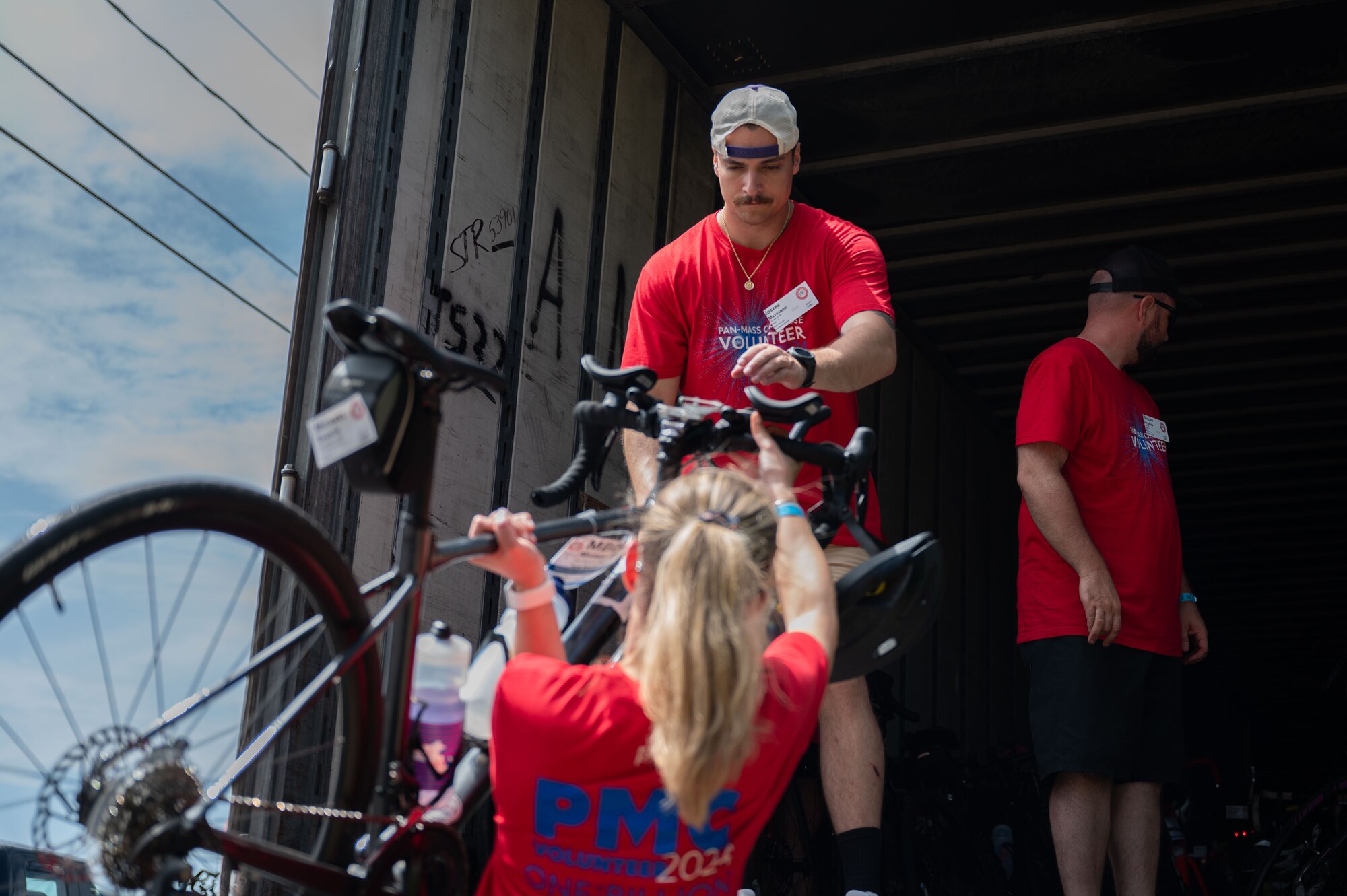 Volunteer holds bike