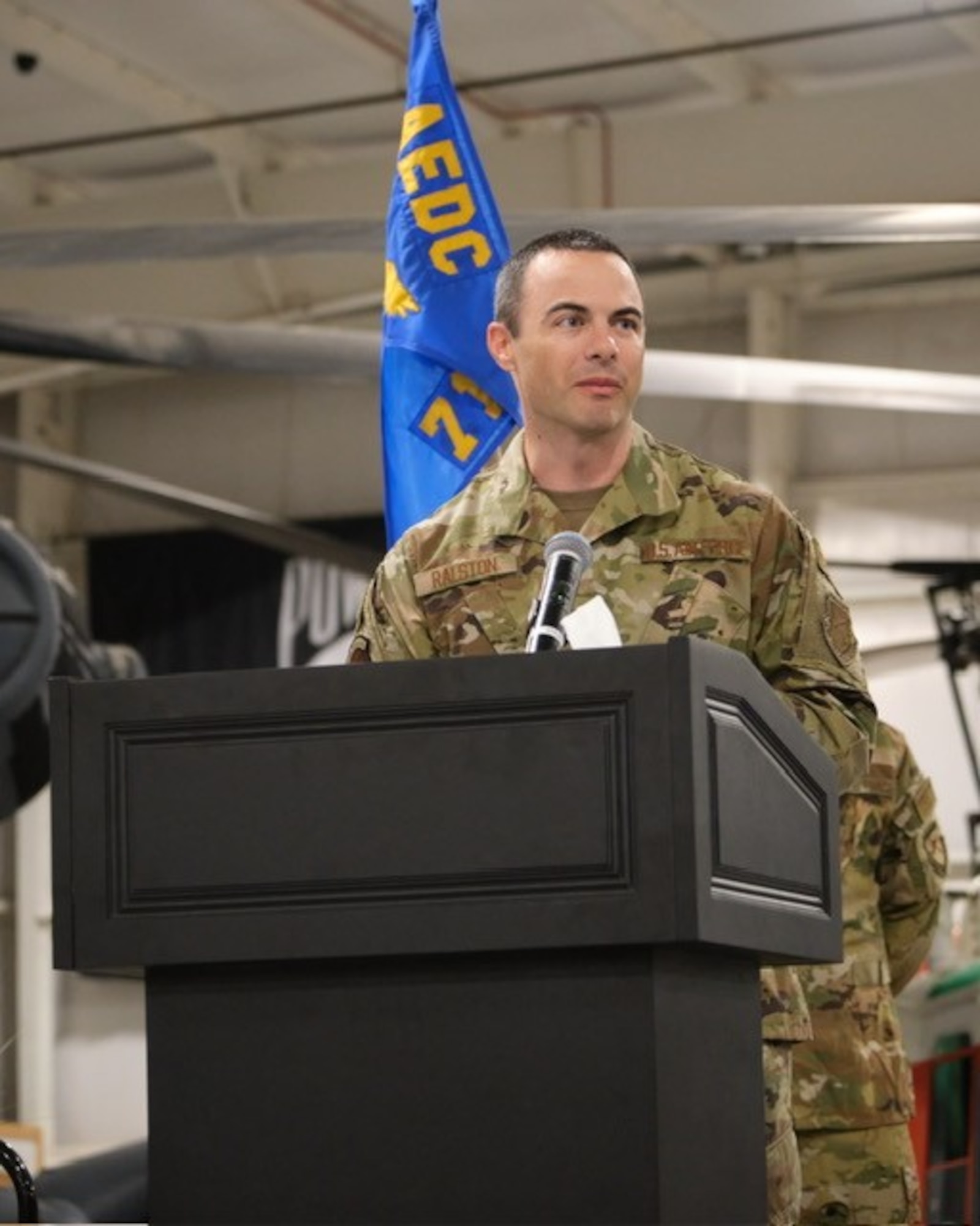 Lt. Col. Bryan Ralston speaks to those in attendance to see him become commander of the Arnold Engineering Development Complex 719th Test Squadron during a Change of Command ceremony July 25, 2024, at Hill Air Force Base, Utah. (U.S. Air Force photo by Benito Gutierrez)