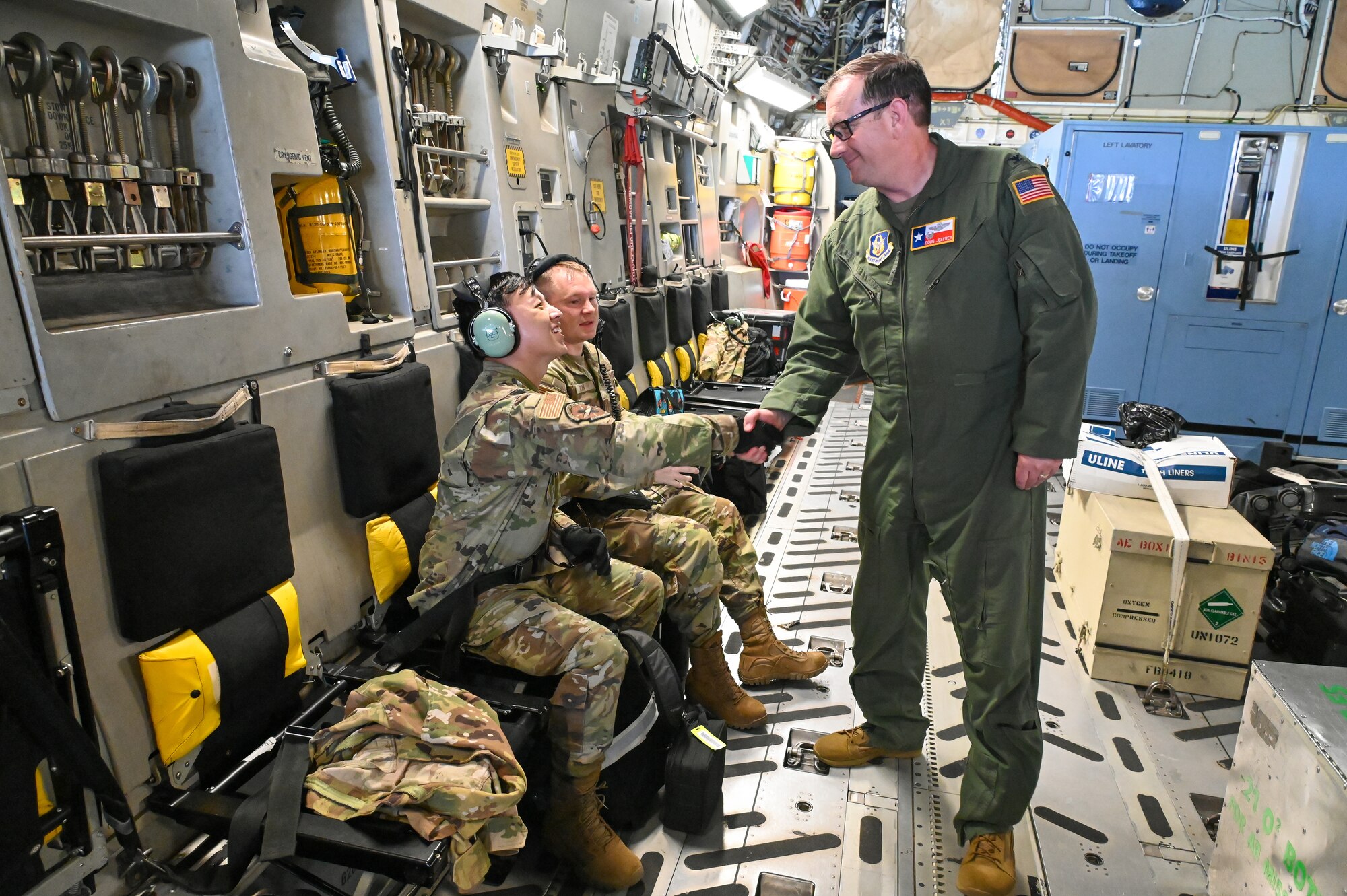 Col. Douglas Jeffrey, 433rd Airlift Wing commander, shakes hands with 433rd Aeromedical Evacuation Squadron airmen during a training event July 12, 2024 at Joint Base San Antonio-Lackland, Texas.