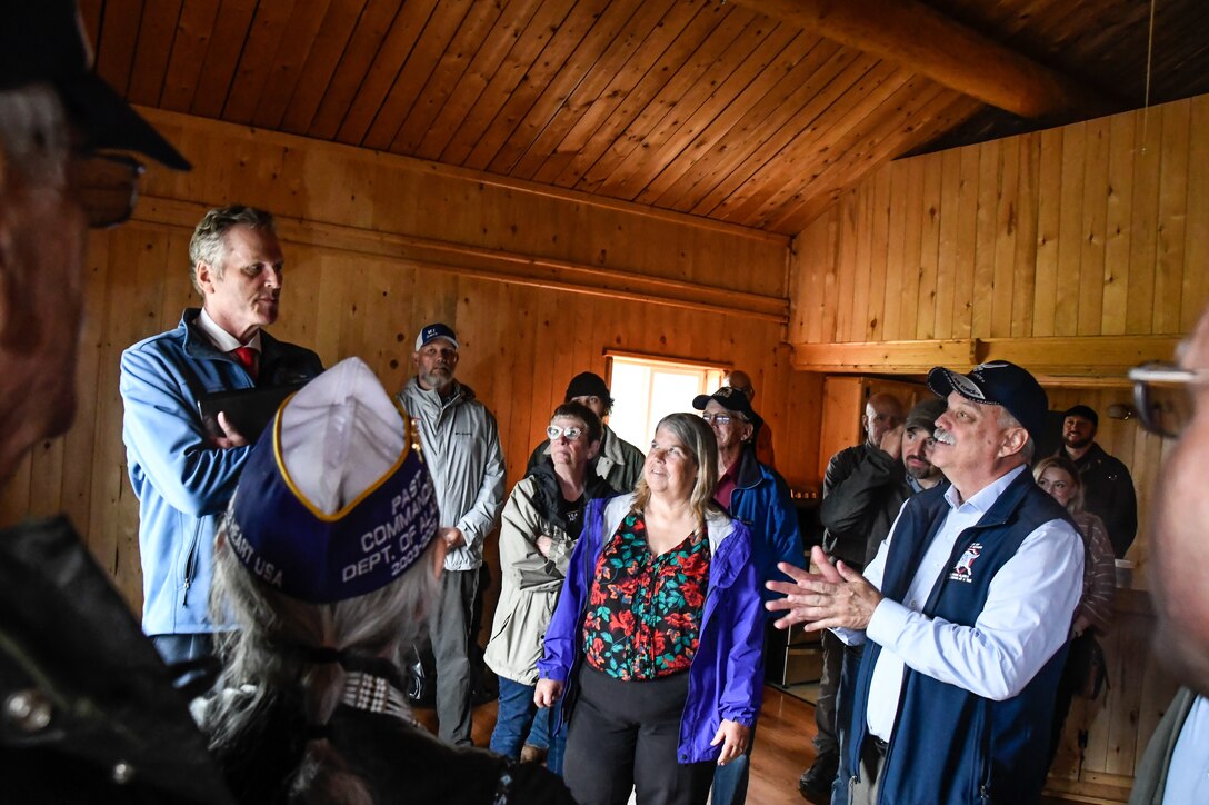 Verdie Bowen Sr., State of Alaska Veterans Affairs Director, talks with Governor of Alaska Mike Dunleavy prior to the open house ceremony of the future site of the Interior Alaska Veterans Cemetery, Salcha, Alaska, July 29, 2024.